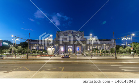 Milano Centrale day to night timelapse in Piazza Duca d'Aosta is the main railway station of the city of Milan in Italy. Milano Centrale day to night timelapse in Piazza Duca d'Aosta is the main railway station of the city of Milan in Italy. 140143048