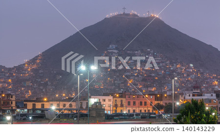 Slums on the slope of hill San Cristobal on the northern side of the river Rimac day to night timelapse. Lima, Peru Slums on the slope of hill San Cristobal on the northern side of the river Rimac day to night timelapse. Lima, Peru 140143229