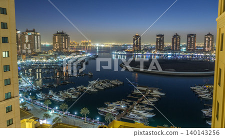 Evening at the Pearl-Qatar day to night timelapse from top. Evening at the Pearl-Qatar day to night timelapse from top. 140143256