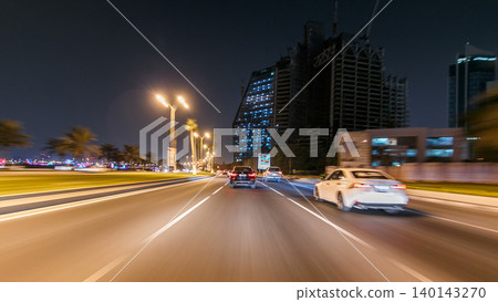 Drive in traffic on the corniche road in Doha timelapse hyperlapse drivelapse. Qatar, Middle East Drive in traffic on the corniche road in Doha timelapse hyperlapse drivelapse. Qatar, Middle East 140143270