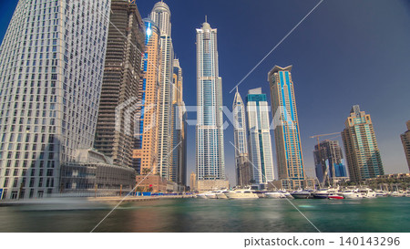 Dubai Marina with tallest skyscrapers and boats timelapse hyperlapse Dubai Marina with tallest skyscrapers and boats timelapse hyperlapse 140143296