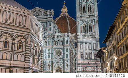Facade and dome of The Basilica di Santa Maria del Fiore day to night timelapse which is the cathedral church Duomo of Florence in Italy Facade and dome of The Basilica di Santa Maria del Fiore day to night timelapse which is the cathedral church Duomo of Florence in Italy 140143320