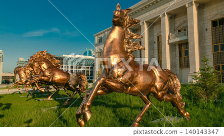 Beautiful sculptures of horses timelapse hyperlapse in front of Astana Opera Theater Beautiful sculptures of horses timelapse hyperlapse in front of Astana Opera Theater 140143347