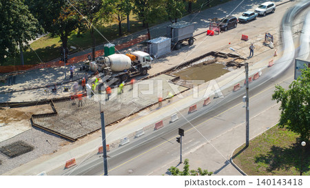 Road construction site with tram tracks repair and maintenance aerial timelapse. Road construction site with tram tracks repair and maintenance aerial timelapse. 140143418