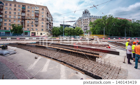 Road construction site with tram tracks repair and maintenance timelapse. Road construction site with tram tracks repair and maintenance timelapse. 140143419