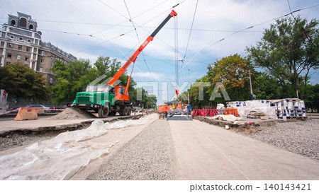 Road construction site with tram tracks repair and maintenance timelapse hyperlapse. Road construction site with tram tracks repair and maintenance timelapse hyperlapse. 140143421