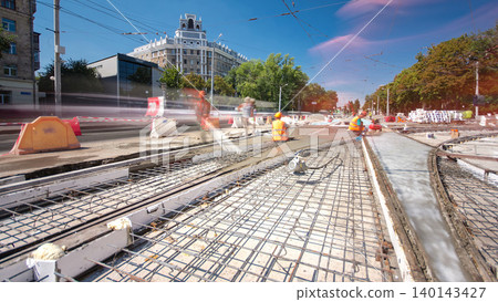 Road construction site with tram tracks repair and maintenance timelapse hyperlapse. Road construction site with tram tracks repair and maintenance timelapse hyperlapse. 140143427