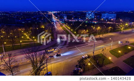 Road intersection with reconstructed tram tracks aerial panoramic day to night timelapse. Road intersection with reconstructed tram tracks aerial panoramic day to night timelapse. 140143428