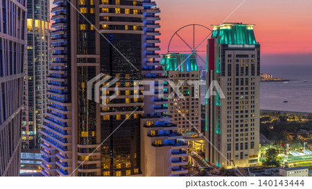 JBR and Bluewaters island after sunset aerial day to night timelapse JBR and Bluewaters island after sunset aerial day to night timelapse 140143444