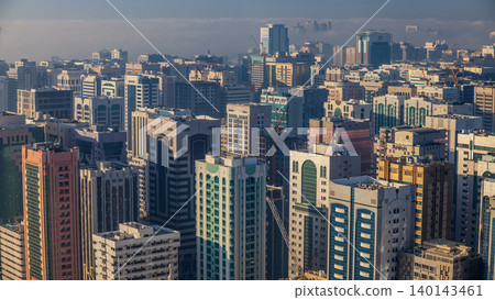 Skylines under the thick fog at the street timelapse of Abu Dhabi at morning 140143461