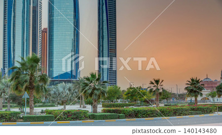 Skyscrapers of Abu Dhabi at sunset with Etihad Towers buildings timelapse. Skyscrapers of Abu Dhabi at sunset with Etihad Towers buildings timelapse. 140143480