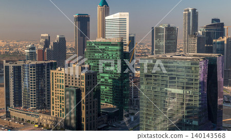 Dubai's business bay towers at morning aerial timelapse. Dubai's business bay towers at morning aerial timelapse. 140143568