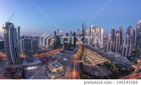 Panorama of Business bay Dubai night to day aerial timelapse. Panorama of Business bay Dubai night to day aerial timelapse. 140143569