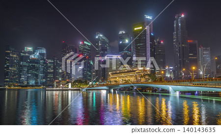 Esplanade bridge and downtown core skyscrapers in the background Singapore night timelapse hyperlapse Esplanade bridge and downtown core skyscrapers in the background Singapore night timelapse hyperlapse 140143635
