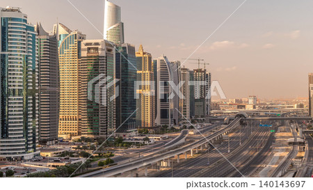 Aerial top view to Sheikh Zayed road near Dubai Marina and JLT timelapse, Dubai. Aerial top view to Sheikh Zayed road near Dubai Marina and JLT timelapse, Dubai. 140143697