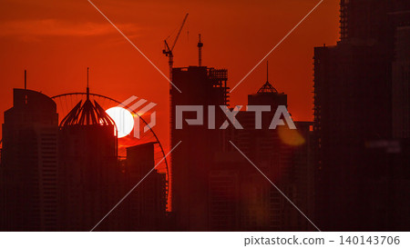 Dubai Marina skyscrapers from golf course sunset timelapse, Dubai, United Arab Emirates Dubai Marina skyscrapers from golf course sunset timelapse, Dubai, United Arab Emirates 140143706