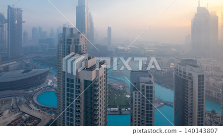 Foggy morning in downtown of Dubai night to day timelapse. Foggy morning in downtown of Dubai night to day timelapse. 140143807