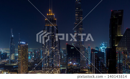 Dubai downtown skyline night timelapse with tallest building and Sheikh Zayed road traffic, UAE Dubai downtown skyline night timelapse with tallest building and Sheikh Zayed road traffic, UAE 140143814