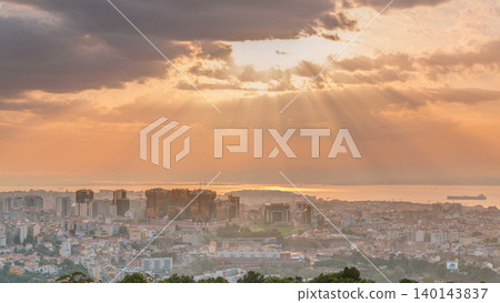 Panoramic sunrise view over Lisbon and Almada from a viewpoint in Monsanto morning timelapse. Panoramic sunrise view over Lisbon and Almada from a viewpoint in Monsanto morning timelapse. 140143837