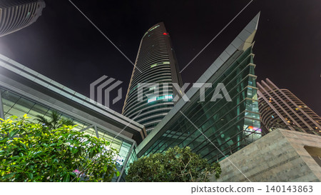 Residential buildings look up in Jumeirah Lake Towers timelapse in Dubai, UAE. Residential buildings look up in Jumeirah Lake Towers timelapse in Dubai, UAE. 140143863