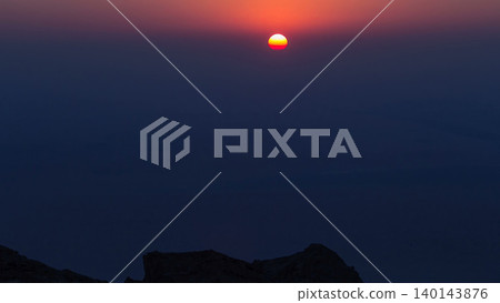 Sunset with rocks timelapse. Jebel Hafeet is a mountain located primarily in the environs of Al Ain 140143876