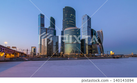 Moscow City skyscrapers in winter day to night timelapse. 140143894