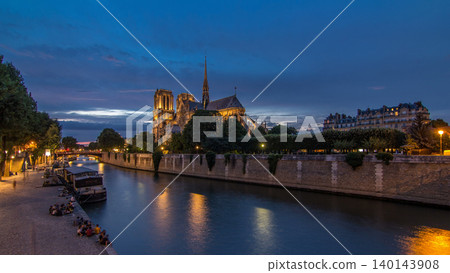 Cathedral Notre Dame de Paris day to night timelapse after sunset in Paris, France. Cathedral Notre Dame de Paris day to night timelapse after sunset in Paris, France. 140143908
