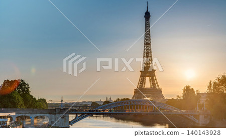Eiffel Tower sunrise timelapse with boats on Seine river and in Paris, France. 140143928