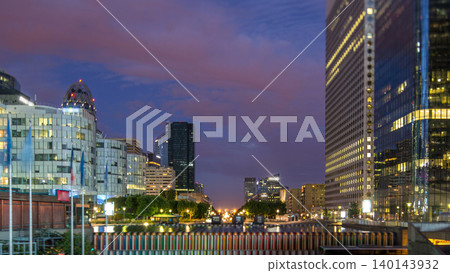 Paris cityscape with modern buildings in business district La Defense day to night timelapse. Paris, France Paris cityscape with modern buildings in business district La Defense day to night timelapse. Paris, France 140143932