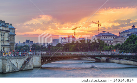 Le Pont D'Arcole bridge at sunset with boats timelapse, Paris, France, Europe 140143934