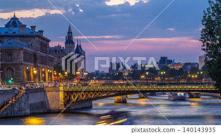 Le Pont D'Arcole bridge after sunset with boats day to night timelapse, Paris, France, Europe Le Pont D'Arcole bridge after sunset with boats day to night timelapse, Paris, France, Europe 140143935