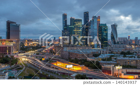 Night to day view of the city traffic timelapse and Building of Moscow International Business Center Moscow-City Night to day view of the city traffic timelapse and Building of Moscow International Business Center Moscow-City 140143937