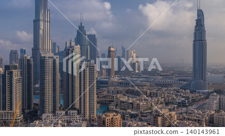Dubai Downtown at sunrise timelapse. Aerial view over big futuristic city. Dubai Downtown at sunrise timelapse. Aerial view over big futuristic city. 140143961