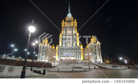 Hotel Ukraine winter night timelapse hyperlapse with bridge over Moscow River. 140143980