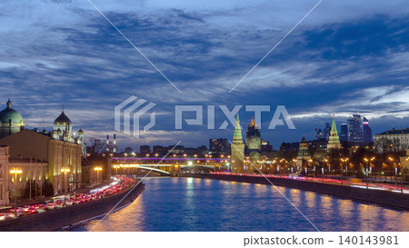 Ensemble of Moscow Kremlin and Moskva-City business center view across Moskva river at a winter day to night timelapse hyperlapse 140143981