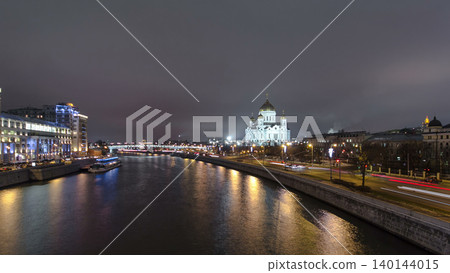 Majestic orthodox Cathedral of Christ Saviour illuminated at dusk on bank of Moscow river. Timelapse hyperlapse, Russia Majestic orthodox Cathedral of Christ Saviour illuminated at dusk on bank of Moscow river. Timelapse hyperlapse, Russia 140144015