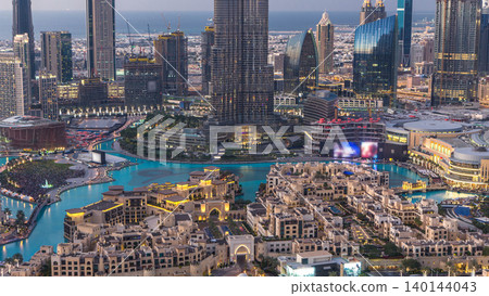 Dubai Downtown day to night timelapse view from the top in Dubai, United Arab Emirates Dubai Downtown day to night timelapse view from the top in Dubai, United Arab Emirates 140144043