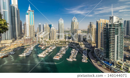 Aerial view timelapse of Dubai Marina at day time in Dubai, UAE Aerial view timelapse of Dubai Marina at day time in Dubai, UAE 140144071