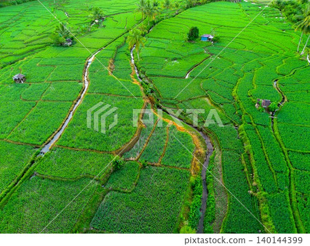 The natural beauty of the Indonesian mountains with beautiful tropical forests at sunrise The natural beauty of the Indonesian mountains with beautiful tropical forests at sunrise 140144399
