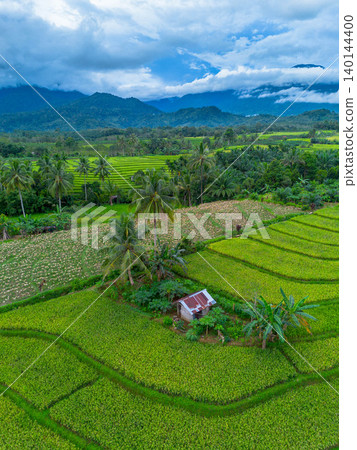 The natural beauty of the Indonesian mountains with beautiful tropical forests at sunrise The natural beauty of the Indonesian mountains with beautiful tropical forests at sunrise 140144400