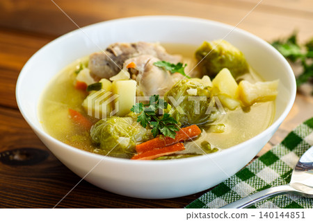 healthy comfort soup with fresh seasonal vegetables and broth healthy comfort soup with fresh seasonal vegetables and broth 140144851