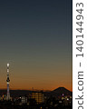 The silhouettes of Tokyo Skytree and Mount Fuji at dusk (vertical composition) 140144943