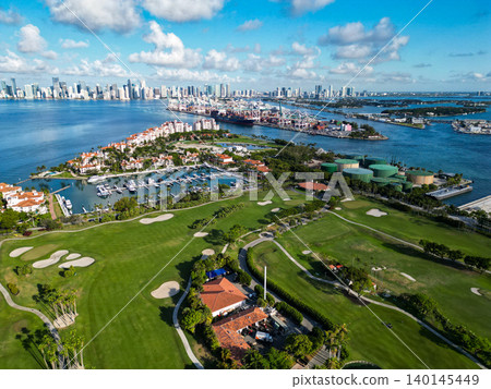 Miami, Florida, USA - June 07, 2024: Fisher island aerial view. Panorama aerial drone view of Fisher island, Miami. Miami beach from drone. Miami panorama, Florida. Panoramic view of Fisher island 140145449