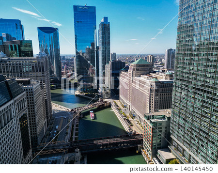 Chicago, USA - October 08, 2024: Downtown architecture and river. Chicago River in City. Chicago city downtown. Skyscraper architecture. City cityscape. Cityscape with skyscraper building, Illinois 140145450