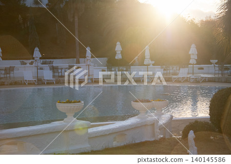 Image of a tropical resort hotel pool. Image of a tropical resort hotel pool. 140145586