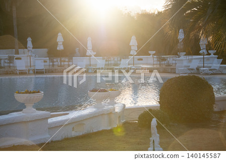 Image of a tropical resort hotel pool. Image of a tropical resort hotel pool. 140145587