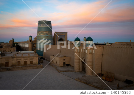 Uzbekistan's World Heritage Sites of Khiva and Kaltamine bathed in the beautiful sunrise. Uzbekistan's World Heritage Sites of Khiva and Kaltamine bathed in the beautiful sunrise. 140145593