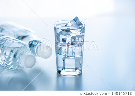 Water poured into a glass Water poured into a glass 140145718