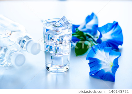 Water poured into a glass Water poured into a glass 140145721