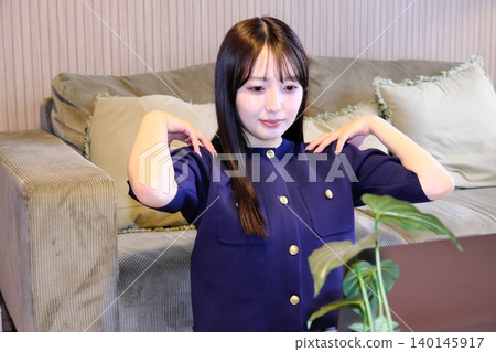 "A healthy daily life, living true to yourself": A scene of self-care in a modern living room, where you can unwind your mind and body. "A healthy daily life, living true to yourself": A scene of self-care in a modern living room, where you can unwind your mind and body. 140145917